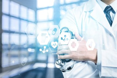 arka plan üzerinde stetoskop ile genç doktor 