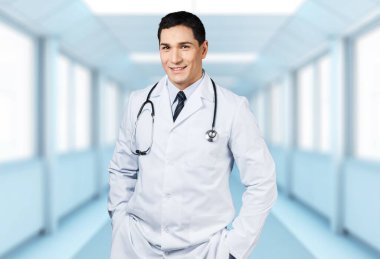 arka plan üzerinde stetoskop ile genç doktor 