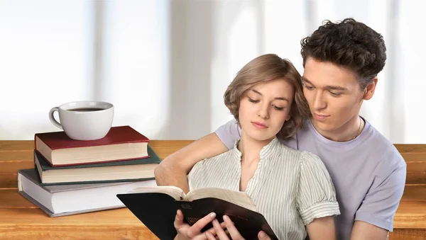 Happy Cheerful Young Couple Hugs Write Bible — Stockfoto