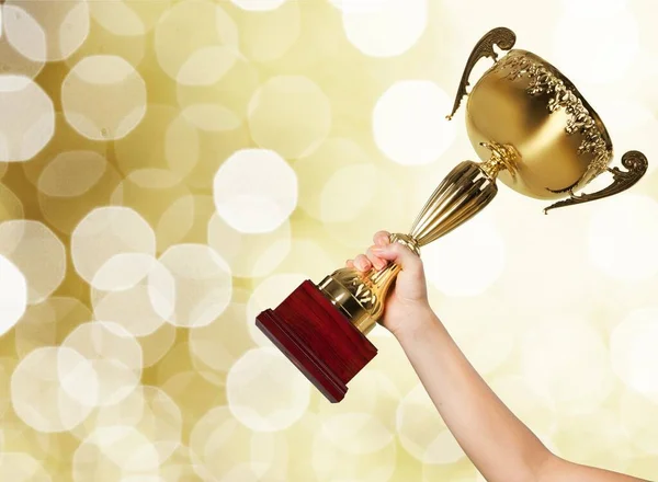 Hand Holding Golden Trophy Cup — Stock Photo, Image