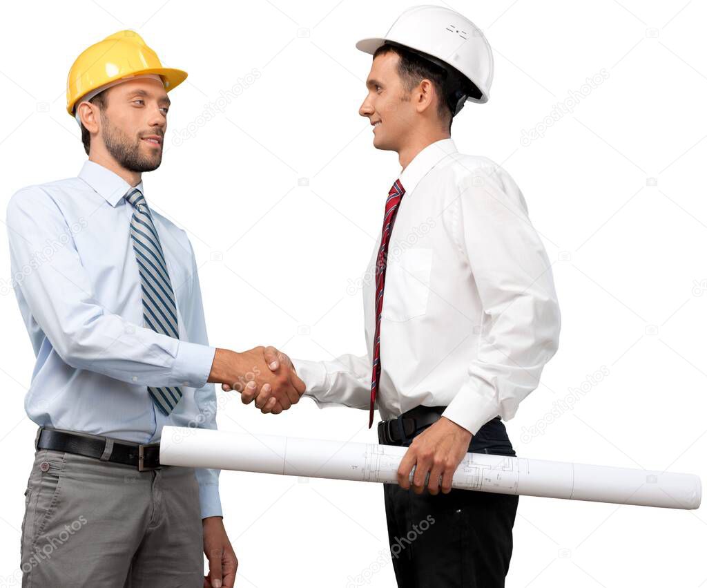 two businessmen in helmets with their hands