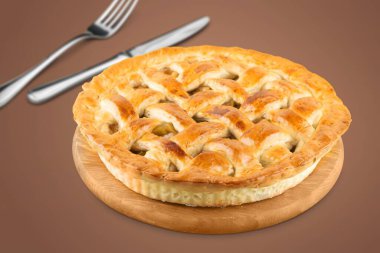 Çatallı peynirli turta ve arka planda bıçak..