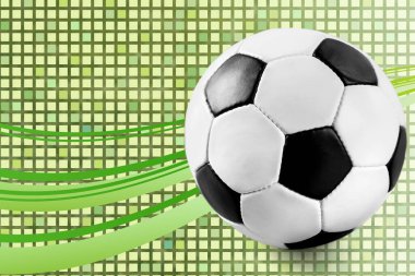 Yeşil zemin üzerinde futbol topu