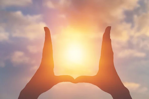 Hands Holding Glowing Light — Stock Photo, Image