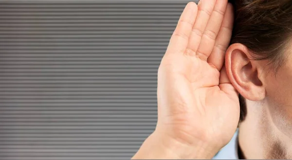 Businessman Holds His Hand His Ear Listening Something — Stock Photo, Image