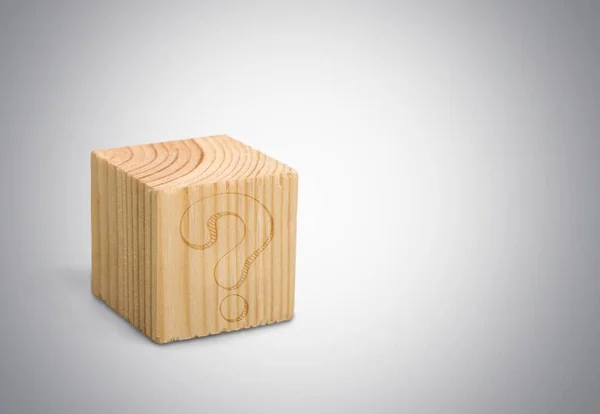 toy cube with question mark