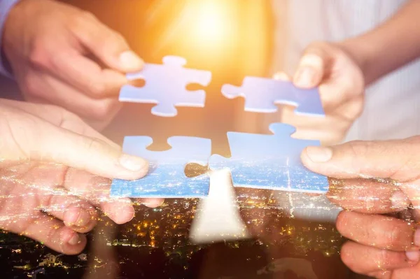 Teamwork Cooperation Partnership Concept Human Hands Holding Puzzle Pieces — Stock Photo, Image