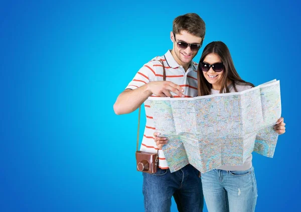 Young Couple Map Blue Background — Stock Photo, Image