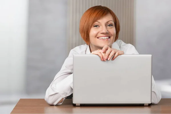 Happy Woman with laptop on background