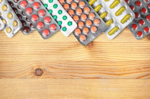 stock image Many colorful pills on background 