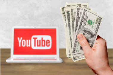 Paralı el ve YouTube logosu
