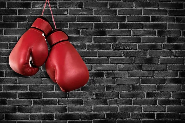 背景の赤いボクシング グローブ — ストック写真