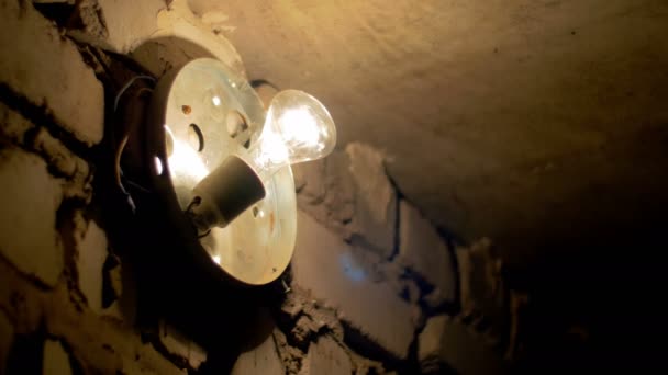 Filament Bulb Lights Off on a Stone Wall — Stok Video