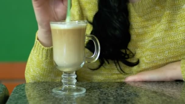 Girl with a Coffee Latte in a Cafe — Stock Video