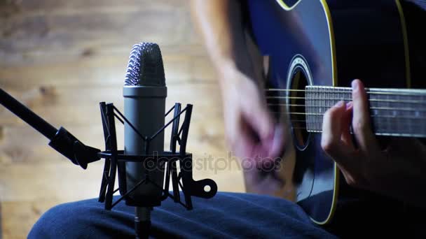 Musician Recording Acoustic Guitar in Microphone on the Home Studio — Stock Video