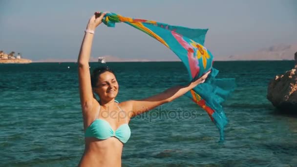 Happy Girl with Scarf Walking on the Summer Beach in Red Sea. Slow Motion — Stock Video