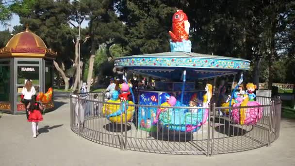 Childrens Attraction Carousel Rotates with Children. — Stok Video