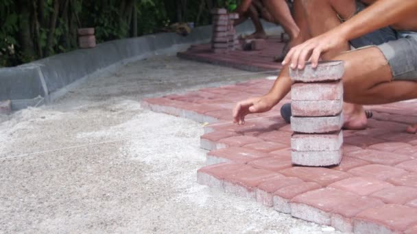 Laying Colored Tiles in a City Park — Stock Footage Laying Colored Tiles in a City Park Stock Footage