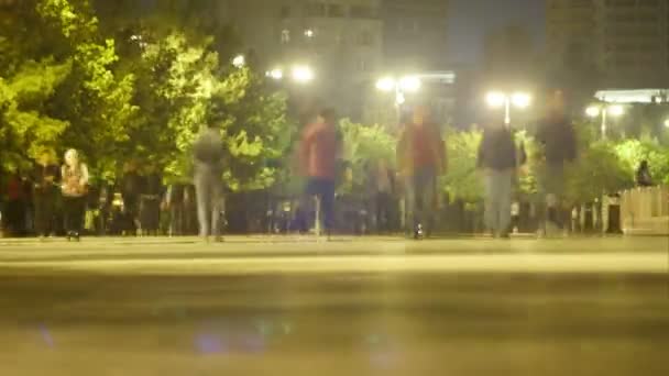 Crowd of People is Walking Along the Night Street. Time lapse. — Stock Video