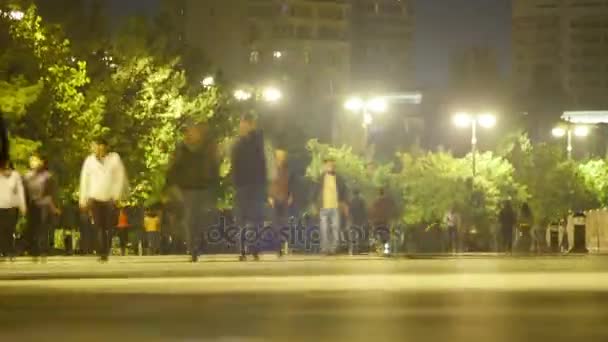 Crowd of People is Walking Along the Night Street. Time lapse. — Stock Video