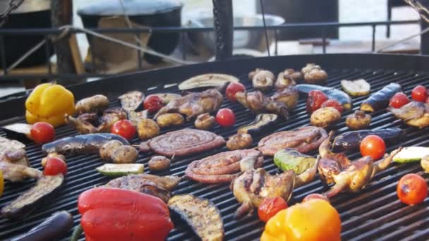 Cooking of Sausages and Vegetables on the Grill — Stock Video