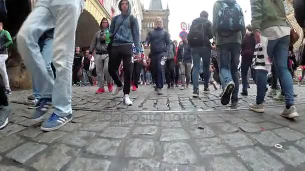 Legs of the Crowd of people cross the road on a pedestrian crossing — Stock Video