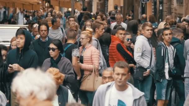 Crowd of People walking along the urban street of the old city in Prague, Czech Republic. Slow Motion — Stock Video