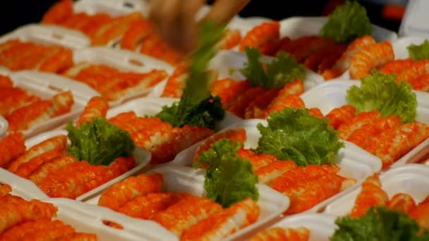 Crab sticks or fish cutlets in a plate on the counter. Asian Street Food in Thailand — Stock Video