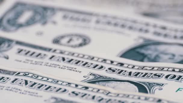 Dólares, el valor de los billetes estadounidenses de un dólar es Rotar — Vídeo de stock