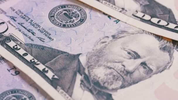 Slow Rotating Fifty Dollars American Bills. Contexte avec de l'argent . — Video