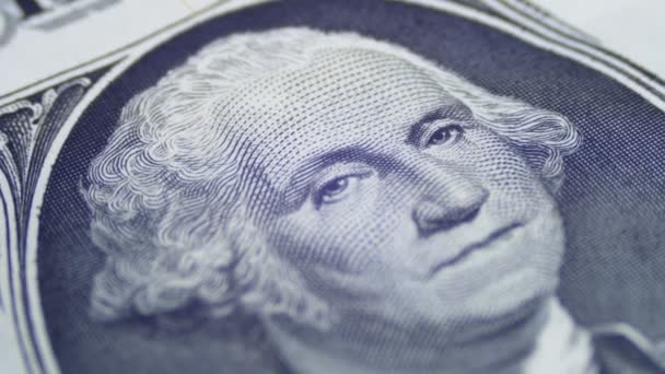 Langsam rotierendes George Washington Porträt auf einem Dollarschein — Stockvideo