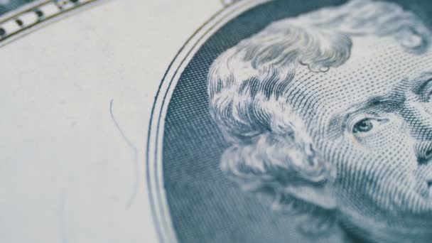 Rotación lenta cara de Thomas Jefferson en billete de dos dólares — Vídeos de Stock