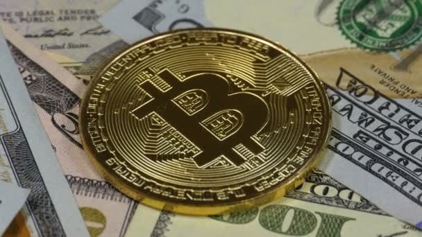 Gold Bitcoin Coin, BTC and Bills of Dollars sedang diputar — Stok Video