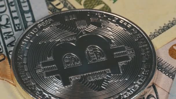 Silver Bitcoin Coin, BTC and Bills of Dollars are Rotating — Stock Video