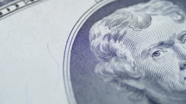 Rotación lenta cara de Thomas Jefferson en billete de dos dólares — Vídeo de stock