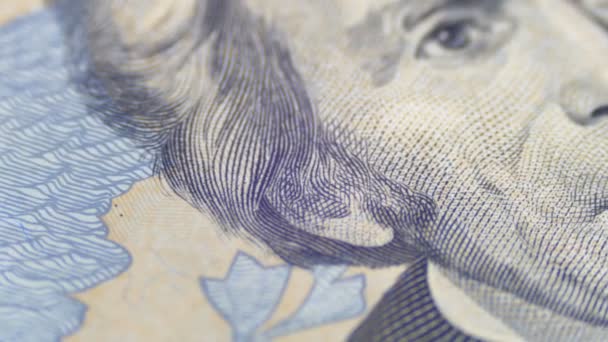 Långsamt roterande porträtt av Andrew Jackson på tjugo dollar Bill i makro — Stockvideo