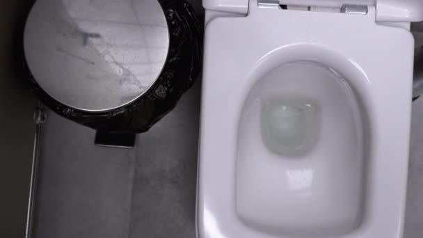 Public Toilet. Cabin with a Toilet Bowl, a Trash Bucket and a Brush — Stock Video