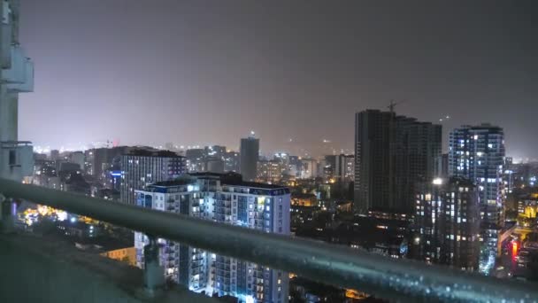 Night City with Skyscrapers and Luminous Windows at Thunderstorm and Lightning Flash (en inglés). Caducidad — Vídeo de stock