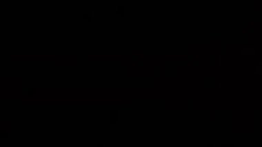 Kırmızı ve Sarı Su Spreyi, Siyah Arkaplanda Karıştırılmış. Yavaş Hareket