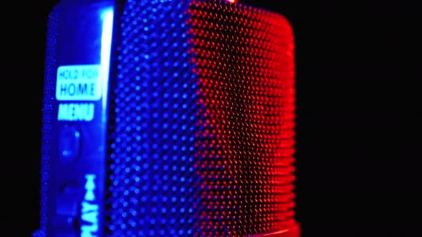 Condenser Microphone Rotates with Blue and Red Backlight. Professional Audio Recorder Close-up — Stock Video