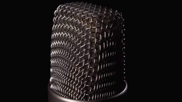 Studio Condenser Microphone Rotates on Black Background — 비디오