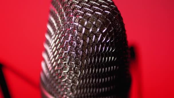 Studio Condenser Microphone Rotates on Red Background. — Stock Video