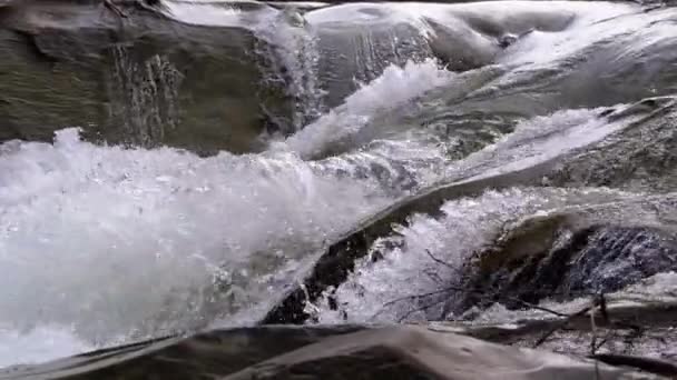 Mountain Creek and Stone Rapids with Snow. Rapid Flow of Water. Winter Waterfall. Slow Motion — Wideo stockowe