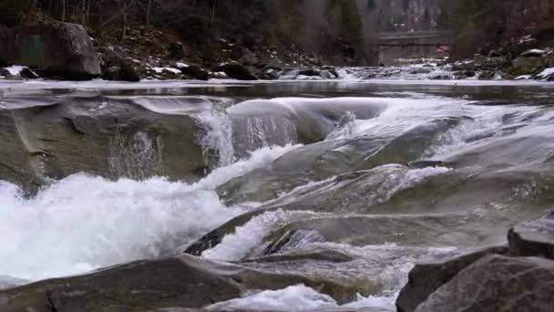 Mountain Creek and Stone Rapids with Snow. Rapid Flow of Water. Winter Waterfall. Slow Motion — Stock Video