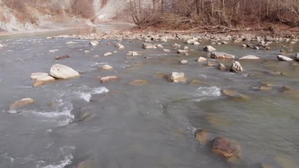 Flying over Wild Mountain River Flowing with Stone Boulders and Rapids — Stok video