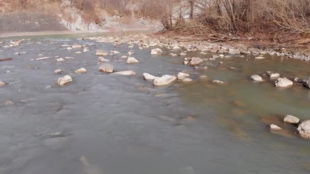 Flying over Wild Mountain River Flowing with Stone Boulders and Rapids — Stock video