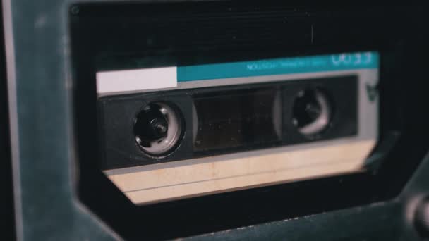 Audio Cassette in the Tape Recorder Playing and Rotates — Stock Video
