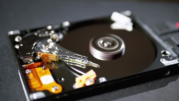 Opened Hard Disk Drive with Spinning Platter. Move of Magnetic Head. Slow Motion — Stock Video