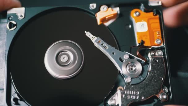 Opened Hard Disk Drive with Spinning Platter. Move of Magnetic Head. Slow Motion — Stock Video