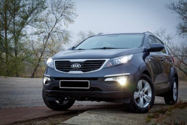 Kia Sportage 2019 stands on the roadside clipart